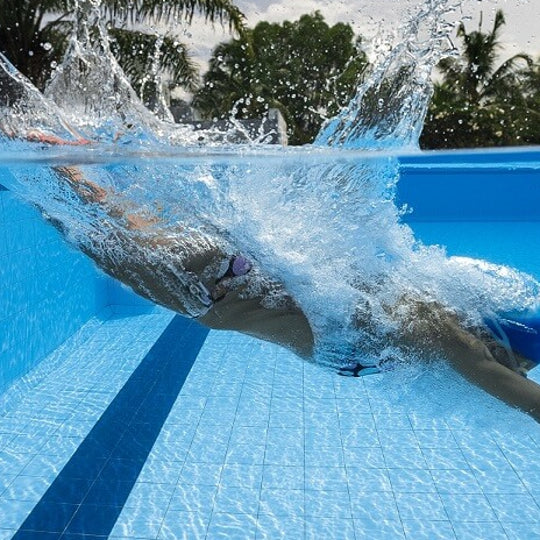 diving into swimming pool
