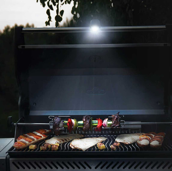 Handle-Mounted Grill Light on top of grill lighting up food
